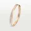 Brățară Trinity din aur tricolor, model clasic | Cartier Us