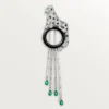 Broșă Panthere De Cartier – Aur alb, smaralde, onix, diamante – Cartier