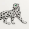 Broșă Panthere De Cartier – Aur alb, smaralde, onix, diamante – Cartier Broșă Panthere De Cartier – Aur alb, smaralde, onix, diamante – Cartier