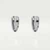 Cercei mici cu diamante Panthere, aur alb | Cartier Us