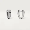 Cercei mici cu diamante Panthere, aur alb | Cartier Us