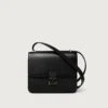 Geantă de umăr, Mini, Double C De Cartier – Piele de vițel neagră, finisaj auriu și email negru – Cartier
