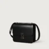 Geantă de umăr, Mini, Double C De Cartier – Piele de vițel neagră, finisaj auriu și email negru – Cartier