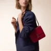 Geantă de umăr, Mini, Double C De Cartier – Piele de vițel roșu cireș, finisaj auriu și email roșu cireș – Cartier