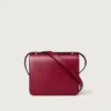 Geantă de umăr, Mini, Double C De Cartier – Piele de vițel roșu cireș, finisaj auriu și email roșu cireș – Cartier