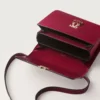 Geantă de umăr, Mini, Double C De Cartier – Piele de vițel roșu cireș, finisaj auriu și email roșu cireș – Cartier