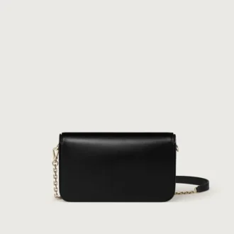 Geantă mini cu lanț, Double C De Cartier – Piele de vițel neagră, finisaj auriu și email negru – Cartier