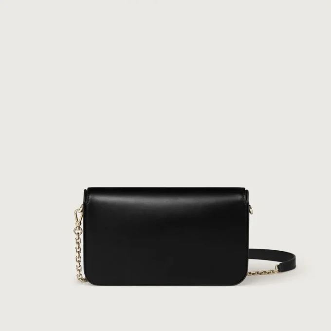 Geantă mini cu lanț, Double C De Cartier – Piele de vițel neagră, finisaj auriu și email negru – Cartier