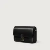 Geantă mini cu lanț, Double C De Cartier – Piele de vițel neagră, finisaj auriu și email negru – Cartier