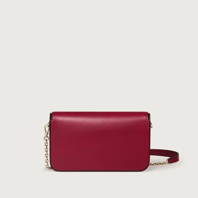 Geantă mini cu lanț, Double C De Cartier – Piele de vițel roșu cireș, finisaj auriu și email roșu cireș – Cartier
