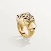 Inel Panthere De Cartier – Aur galben, lac, granat tsavorit, onix – Cartier