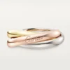 Inel Trinity din aur tricolor, model clasic | Cartier Us Inel Trinity din aur tricolor, model clasic | Cartier Us
