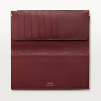 Portofel internațional cu clapete, Must De Cartier – piele de vițel burgund, finisaj auriu – Cartier