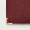 Portofel internațional cu clapete, Must De Cartier – piele de vițel burgund, finisaj auriu – Cartier