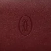 Portofel internațional cu clapete, Must De Cartier – piele de vițel burgund, finisaj auriu – Cartier